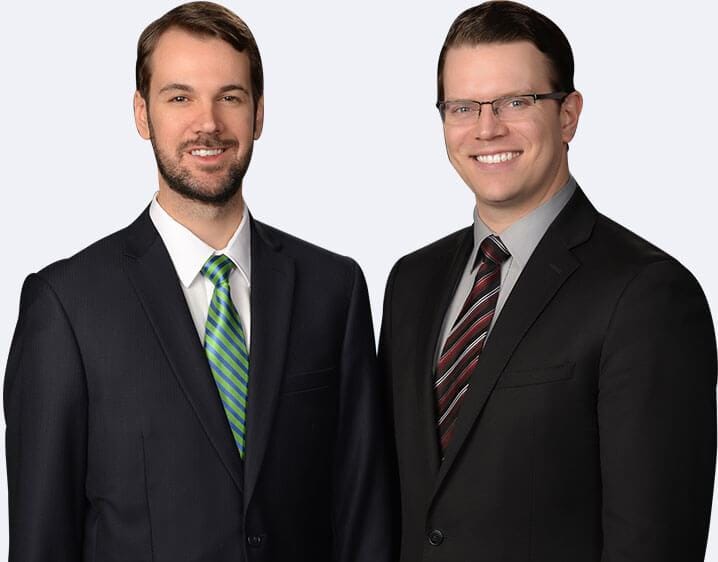 Photo of attorneys John F. Kennel and Andrew J. Zeigler